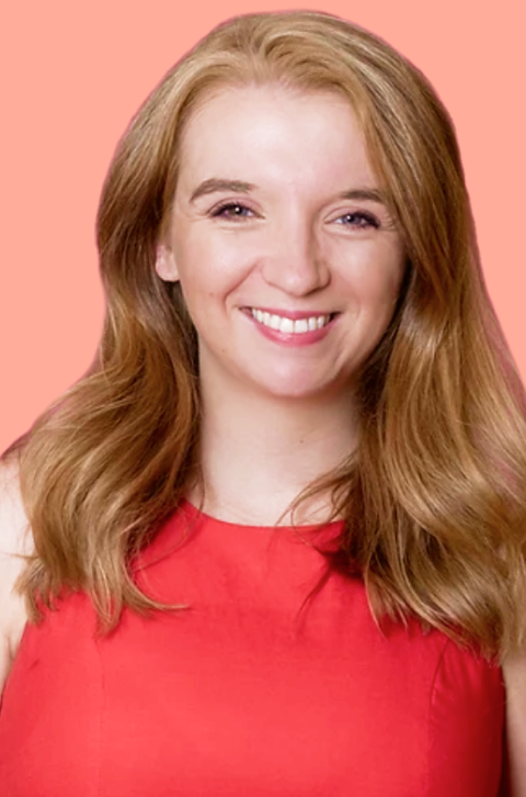 Woman with blonde hair in a red dress smiling